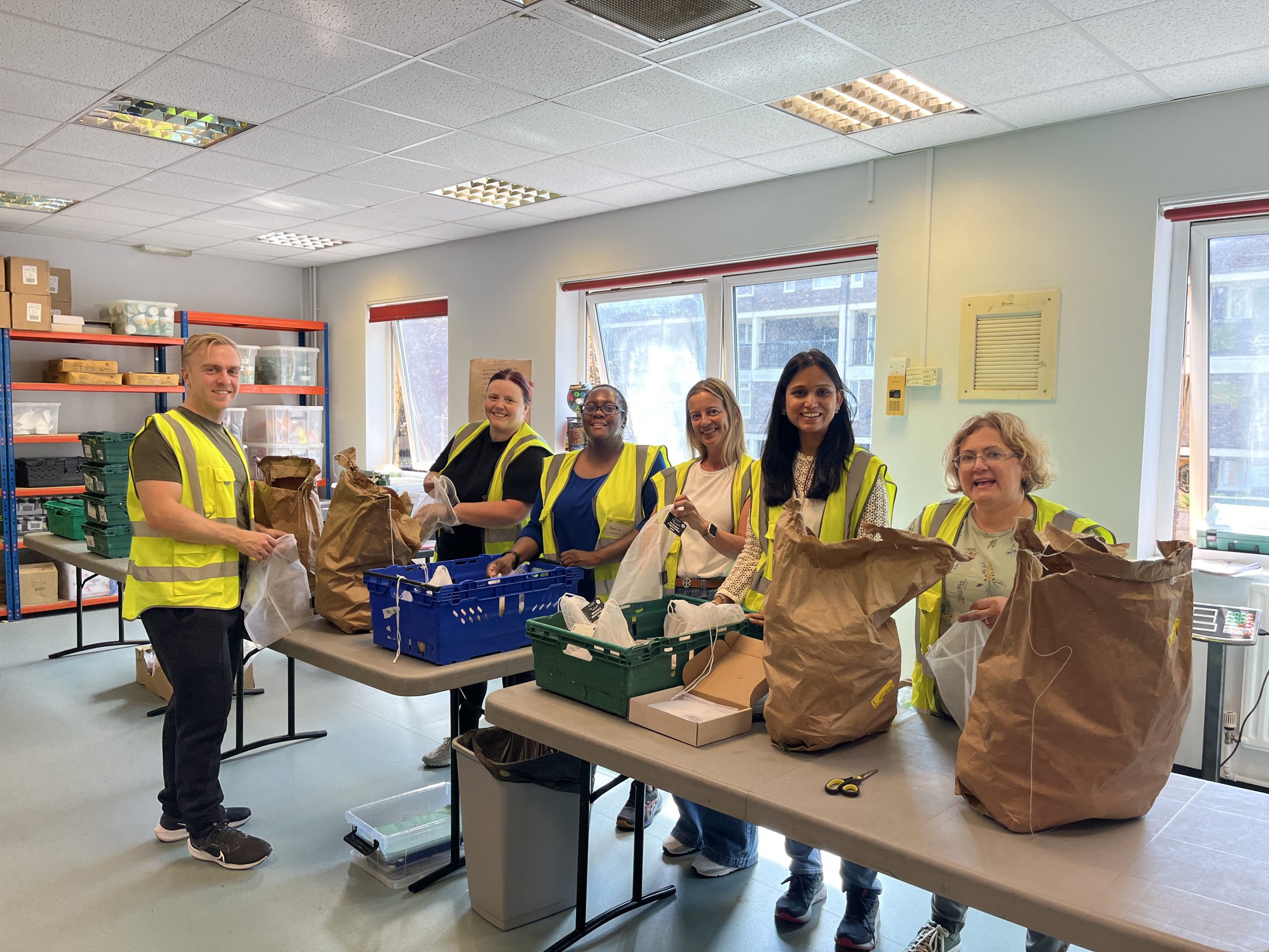 Corporate volunteers at Bow Foodbank in East London Corporate volunteers at Bow Foodbank in East London